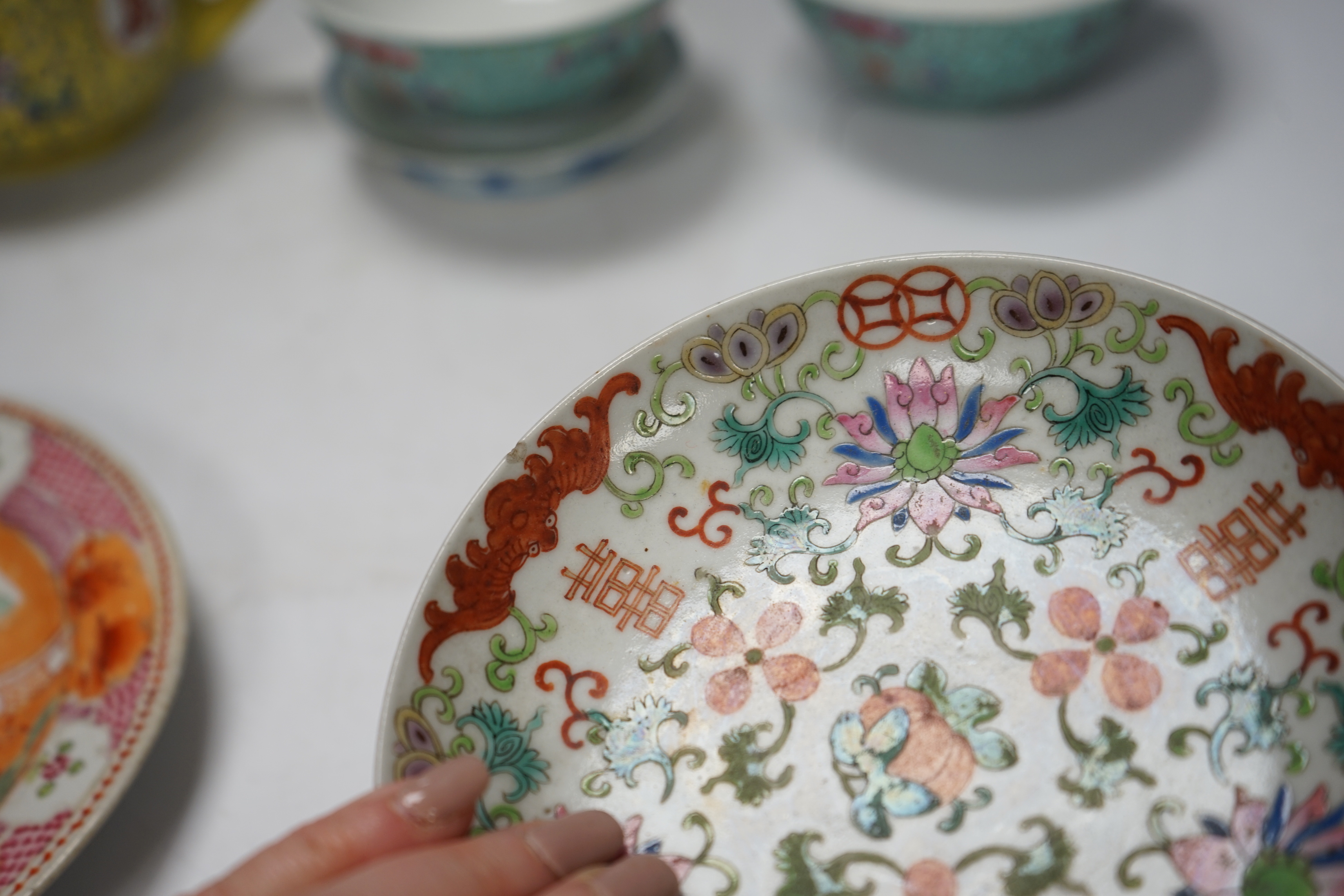 Six Chinese ceramic items; a teapot, two bowls and three small dishes, teapot 10cm